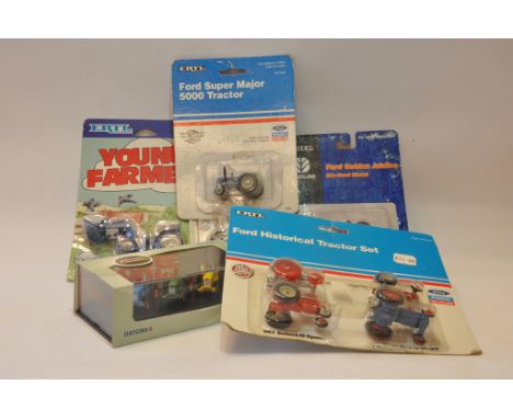 Group of smaller scale tractor models including Ertl and Oxford Diecast. Generally Near Mint into Mint in Boxes. (5)