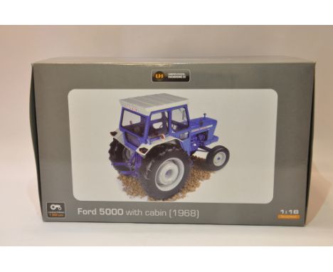 Universal Hobbies 1/16 scale Ford 5000 with cab Tractor. Mint in Box.