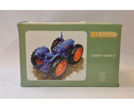 Universal Hobbies 1/16 scale County Super Four Tractor. Mint in Box.