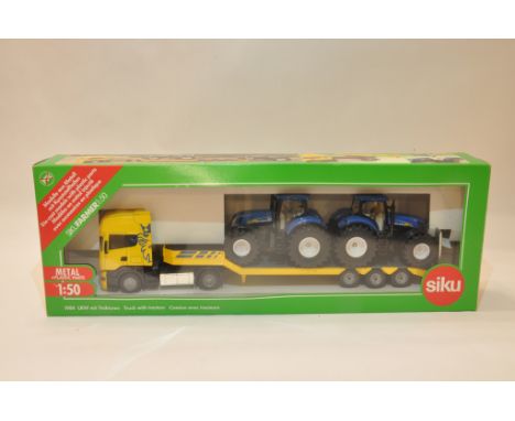 Siku 1/50 scale Truck with Tractors Load Set. Mint in Box.