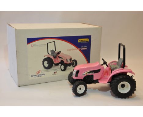 Scale Models 1/16 Scale Pink New Holland TC33DA Tractor. Special Edition. Near Mint. 