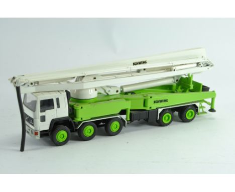 Conrad 1/50 scale No. 3025 5 Axle Volvo Schwing Extendable Concrete Pump Truck. Near Mint to Mint with original box.