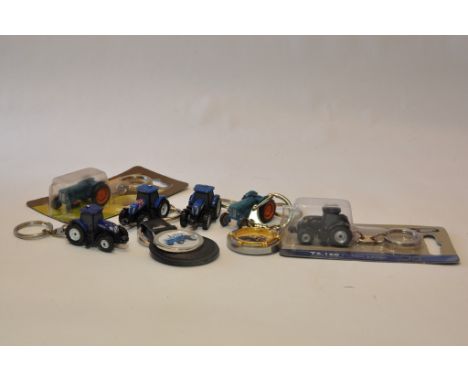 Group of Tractor related Keyrings from various makers. (8)