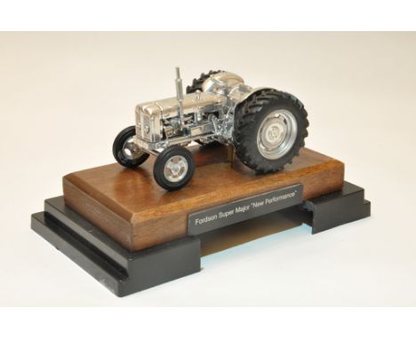 Unique and Bespoke UH 1/32 Fordson Power Major Tractor mounted on a plinth. Finished in Chrome. One Only. 