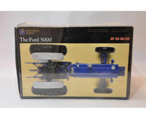 Ertl 1/16 scale Precision Ford 5000 Tractor. Mint in Box.