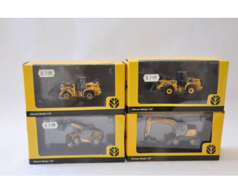 Group of 1/87 scale New Holland Construction models. Mint in Boxes. (4)