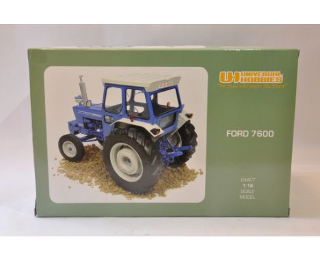 Universal Hobbies 1/16 scale Ford 7600 Tractor. Mint in Box.