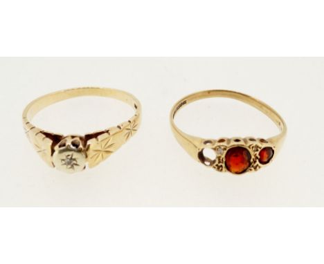 A gold ring set chip diamond - unmarked, size R and a 9 carat gold garnet set ring - a/f, size S &amp; T, 4g 