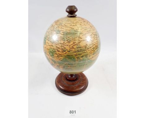 A vintage small globe, 22cm tall 