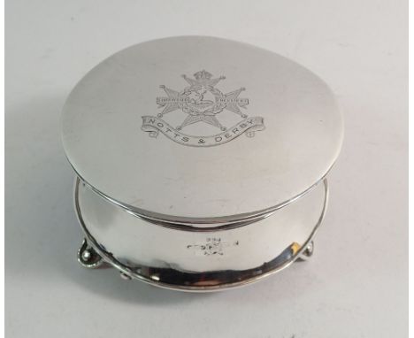 A circular silver trinket box engraved Regimental Crest 'Sherwood Forrester' by J Gloster Ltd, Birmingham 1910 inscribed to i