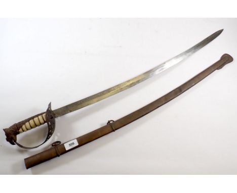 A reproduction Dutch East India Co sword with bone and eagle head handle, pierced hilt and brass scabbard