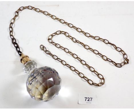 A large cut glass faceted light pull on chain, 13cm tall 