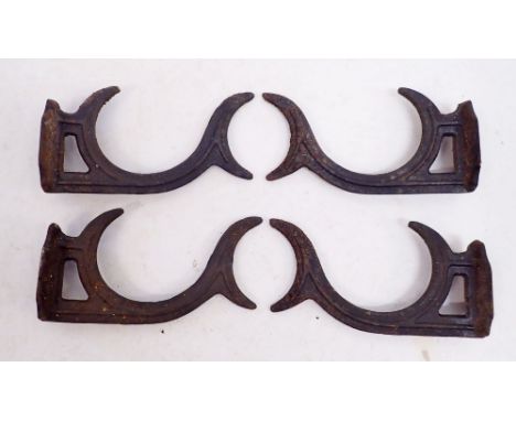 A set of four heavy cast iron stag horn formed coat hooks or wall shelf brackets, not drilled, 25.5cm long 