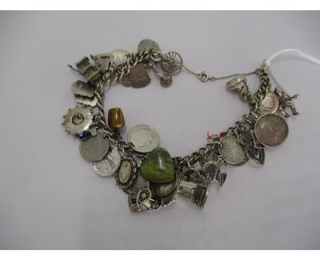 Silver Charm Bracelet with Numerous Charms 