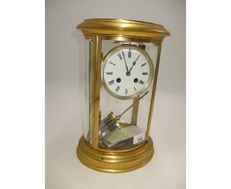 Victorian Oval Brass and Bevelled Glass Mantel Clock by Japy Freres having a Mercury Pendulum Presentation Engraved for 1875,