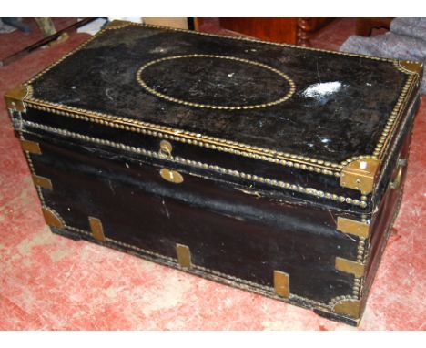 19th century leather brass-studded trunk with lead lining, 107cm long and 57cm wide.