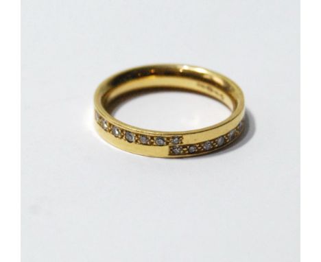 Half eternity ring with two part spirals of diamonds in 18ct gold. Condition Report Size P.  5.5g