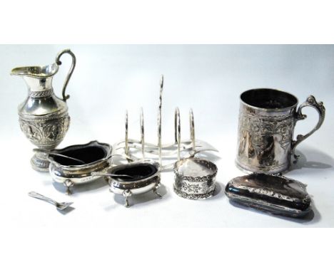 Indian silver embossed jug, a similar EP mug, a toast rack, a purse, two silver salts and a napkin ring.