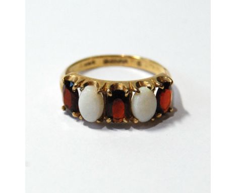 Opal and garnet five-stone ring in 9ct gold.