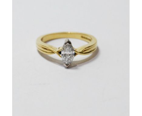 Diamond solitaire ring with marquise brilliant, in 18ct gold. Condition Report Size K½
