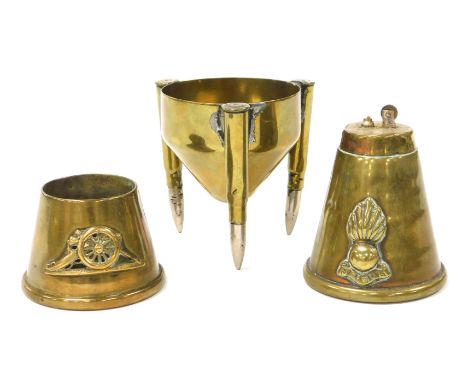 WWI brass ordnance shell cigarette lighter, conical ash receiver and brass trench craft stand. (3) 