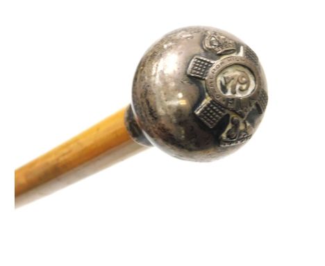 A WWI Malacca cane swagger stick, with silver embossed pommel knop for the Queen's Own Cameron Highlanders, stamped Swaine an