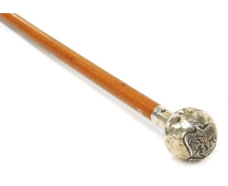 A British Army malacca cane swagger stick, with silver pommel terminal and regimental crest for the Essex Regiment, hallmarke