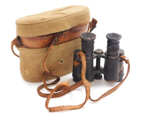 A pair of WWI period binoculars, War Department arrow marks, numbered 26166, in leather case with khaki canvas outer case, th