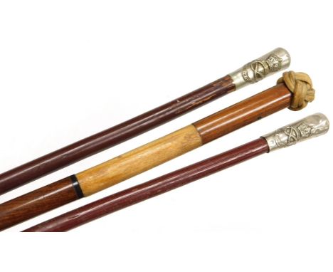 Three British Army regimental swagger sticks, for the South Staffordshire Regiment, two with white metal terminals the other 