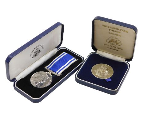 Police interest. A Queen Elizabeth II Police Long Service medal, inscribed to Constable John A Peverill, cased, and a Metropo