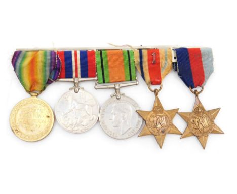 A WWI and WWII medal group, comprising Victory medal inscribed to 19876 Pte. W Hibert, East Lancs Rgt., and 1939-45 British W