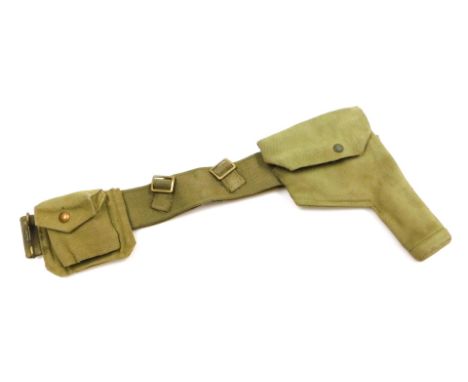 A WWII British Army canvas webbing belt with .38 calibre revolver holster, and ammunition pouch, the holster marked ME Co 193