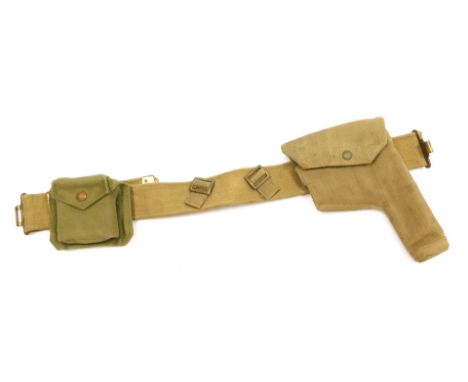 A WWII British Army canvas webbing belt with .38 calibre revolver holster, and ammunition pouch, the holster marked ME Co 194