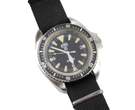 A CWC British Military quartz divers watch, stainless steel case, with black dial and bezel, luminous baton markers, the back