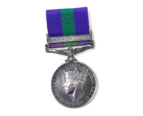 A George VI General Service medal, with Palestine 1945-48 clasp, inscribed to 14135180 Signalman R Hutton R Sigs. 