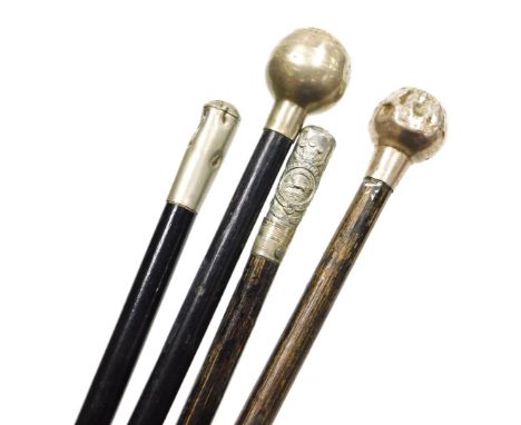 Four British Army ebonised regimental swagger sticks, one with regimental crest terminal for the Somerset Light Infantry, als