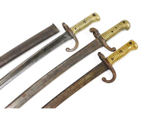 A French M1866 Chassepot bayonet, with brass grip and Yataghan blade, blade 57cm long, with steel scabbard and another French