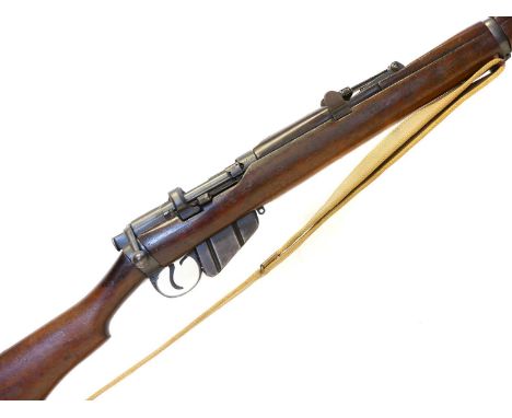 Lee Enfield SMLE .303 bolt action rifle, serial number M82025 to receiver and bolt, by London Small Arms, 24.5inch barrel wit