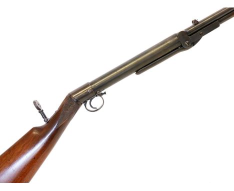 BSA Model D air rifle, serial number 14486, 19inch sighted barrel, the wrist fitted with folding peep sight, chequered 14.5in