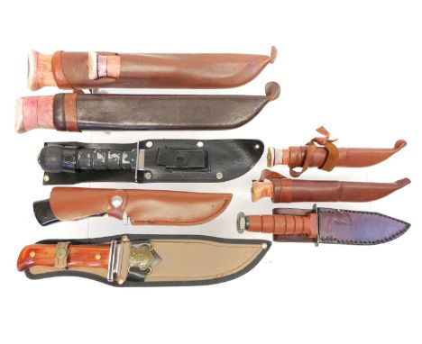 Collection of nine modern hunting / survival knives, all with leather scabbards. THIS LOT CANNOT BE SENT THROUGH THE POST. Th
