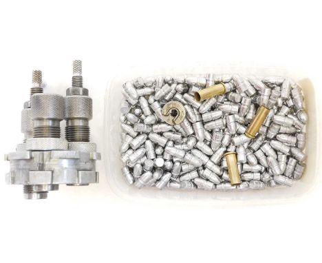 .310 Cadet tools and bullets, including a three dies (lacking the decapping pin) a box of 125 grain RNL bullets, and a box of