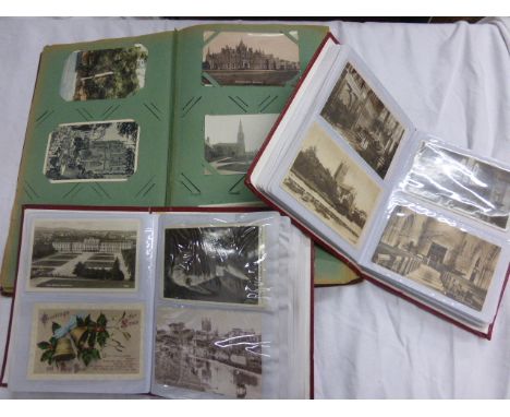 Three postcard albums containing vintage featuring UK, world etc