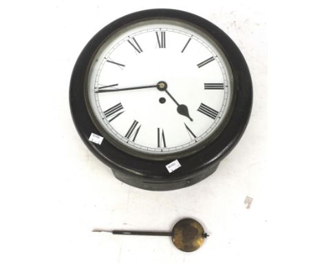 A vintage circular school wall clock. The white enamel dial with Roman numerals, in a mahogany case, Diameter 39cm