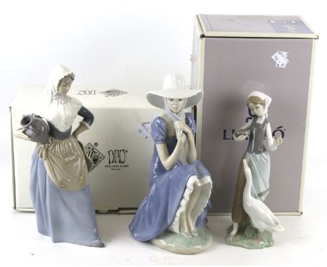 Three Spanish porcelain figures.  Including Lladro 'Girl with a Duck' Daisa 01052 boxed, Nao Daisa 'La Pamela' 00229 boxed, a