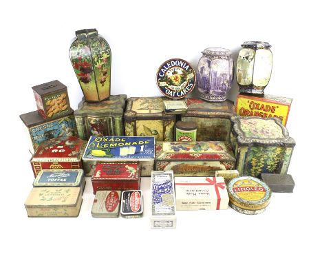 A collection of assorted vintage product advertising tins. Including Oxade Lemonade, Peek Frean's Ginger Nuts, etc. Max. H15c