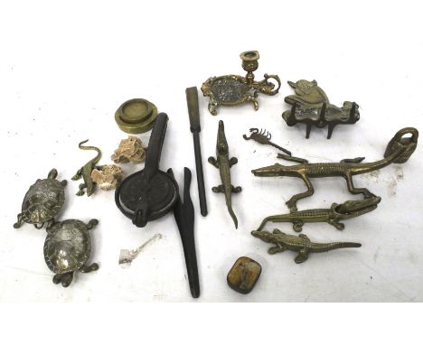 Interesting collection of antique brass and metal items to include nutcrackers and candlestick. Max. H16cm