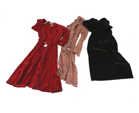 Three vintage dresses. Comprising a Laura Ashley floral dress, a Stamp Taylor red velvet dress and an unbranded black velvet 