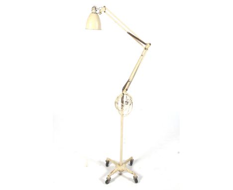 'Anglepoise' mid-century work light on mobile stand, Herbert Terry & Sons Ltd. Stand with four wheels. Height of stand 93.5cm