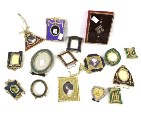 A collection of enamel picture frames and a notebook. Of various designs, some with gilt details, Max L13cm
