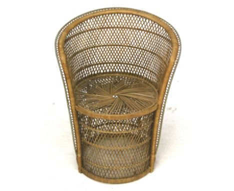 A vintage retro wicker rattan conservatory tub chair. H77cm
